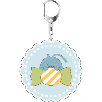 Fullmetal alchemist winry rockbell acrylic keychain featuring a cute blue cartoon shark with yellow candy design and green wings
