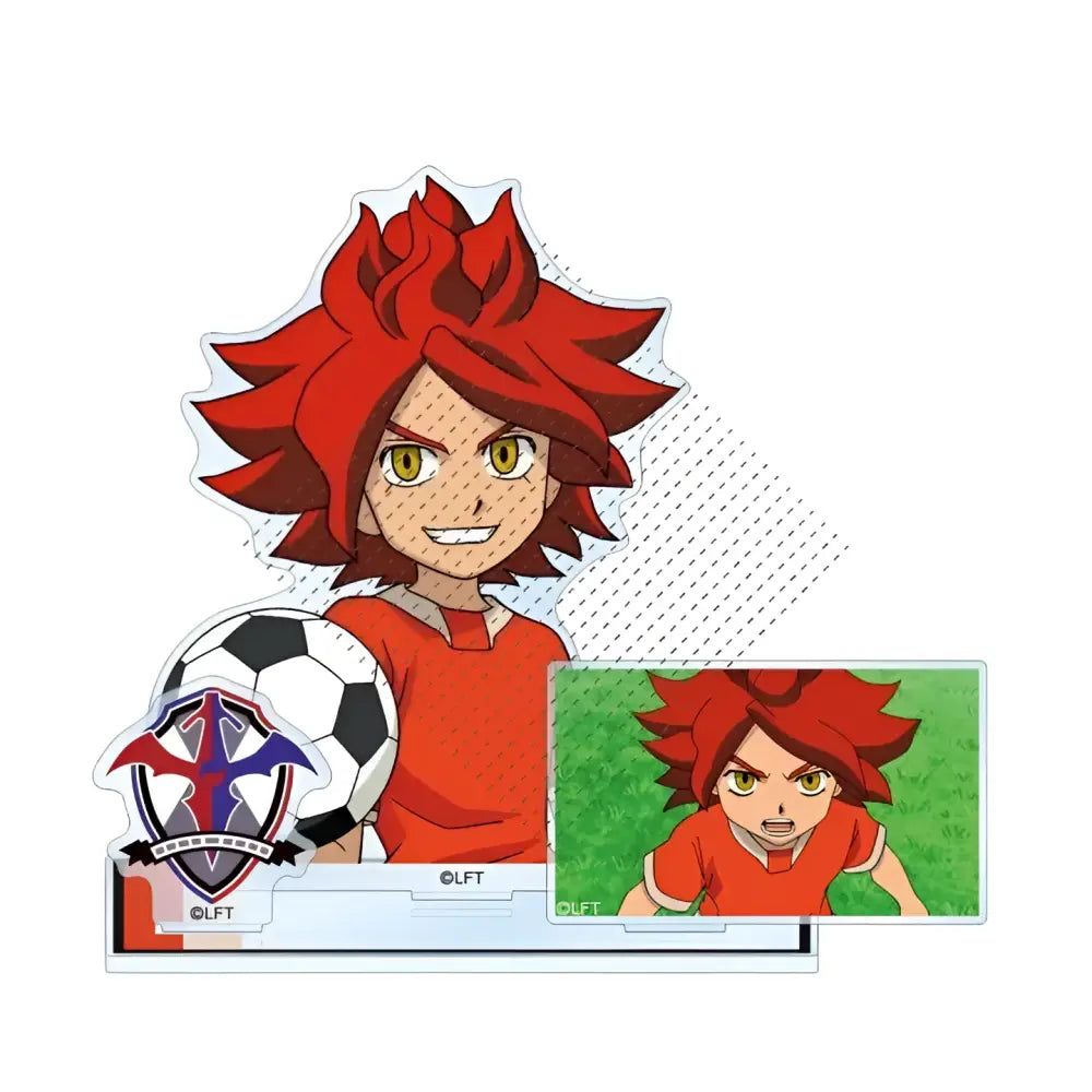 Red-haired anime soccer player with spiky hair and yellow eyes in orange jersey holding black-and-white ball acrylic stand toy