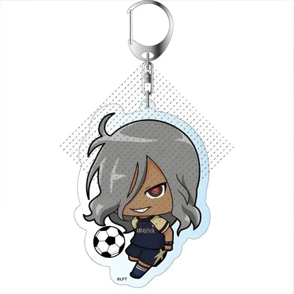 Silver metallic acrylic keychain featuring chibi anime character shuya fubuki in navy soccer uniform holding soccer ball