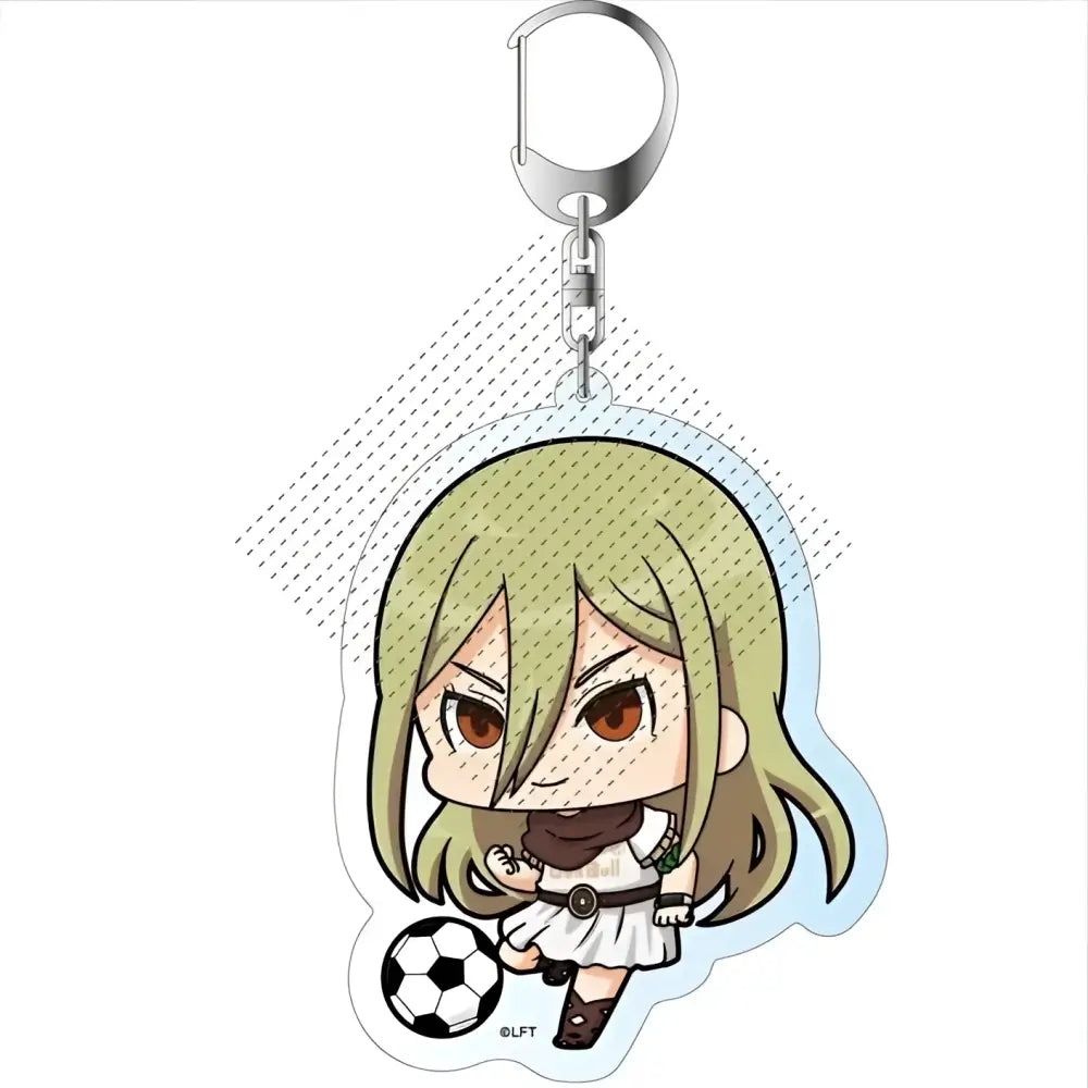 Chibi-style acrylic keychain of blonde anime girl in white soccer uniform holding a black and white soccer ball from game inazuma eleven 11