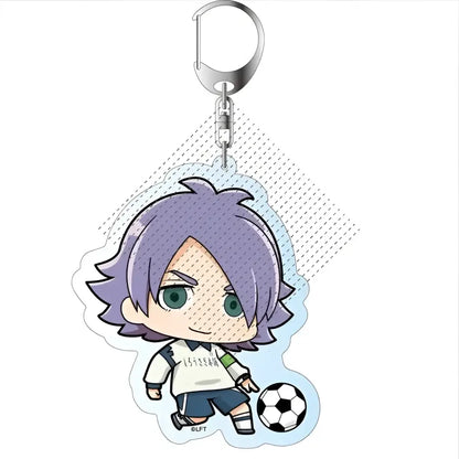Purple-haired chibi anime soccer player keychain with green eyes wearing white jersey and blue shorts holding soccer ball