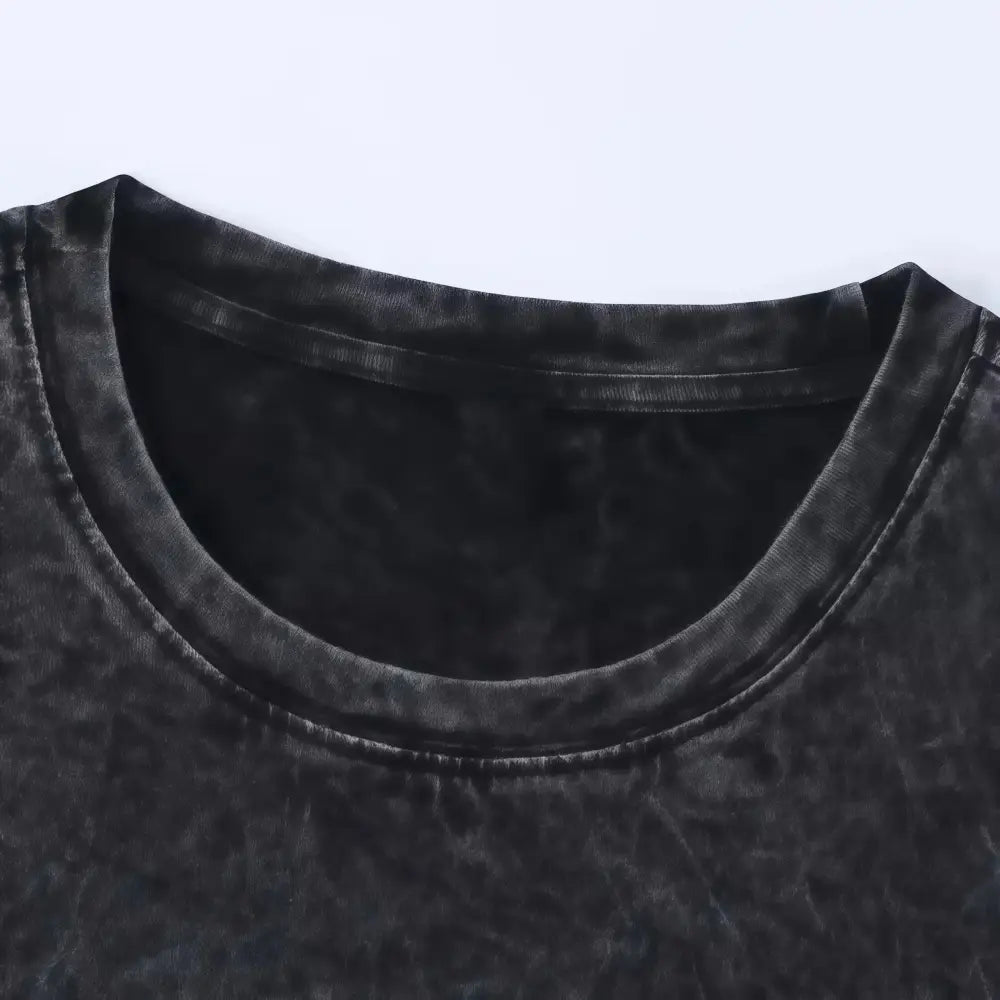 Black distressed cotton oversized t-shirt with faded textured finish and ribbed neckline featuring Gengar ghost design