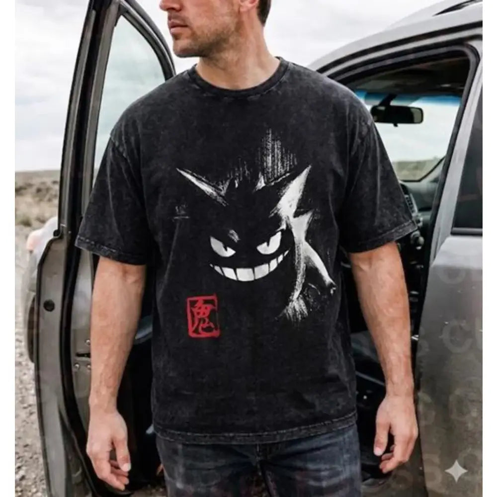 Black distressed 100 percent cotton oversized t-shirt featuring a white and red gengar graphic with its signature grin