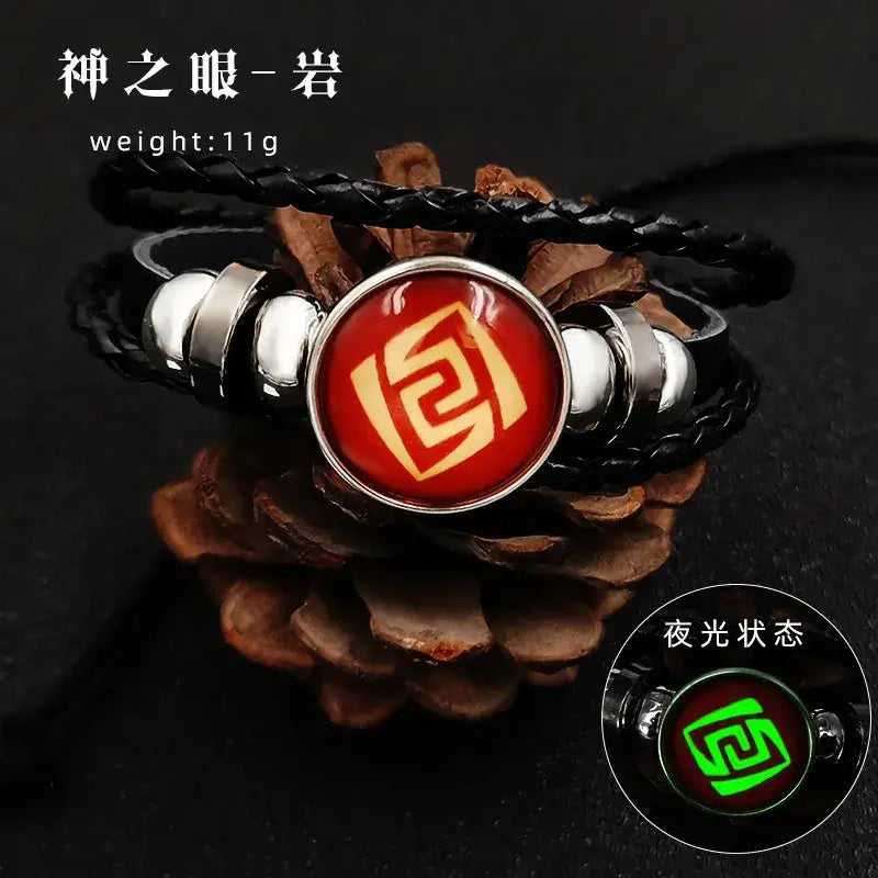 Black braided leather genshin impact vision bracelet featuring red and gold emblem with silver metal accents element leather