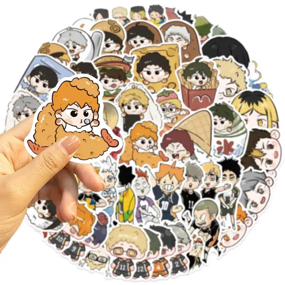 A hand holds an orange-haired character sticker from the haikyuu graffiti sticker set featuring colorful pvc decals