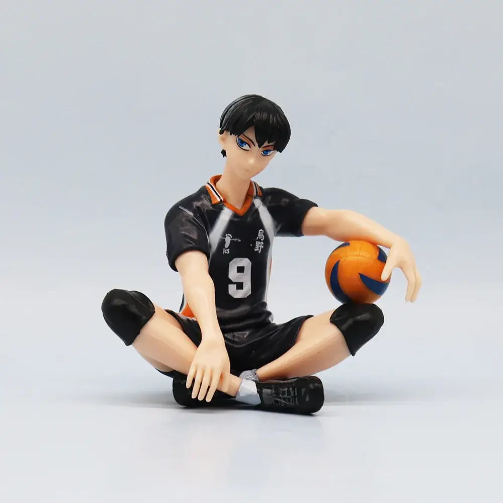 Black and orange pvc haikyuu shoyo hinata noodle stopper figure sitting pose wearing detailed number 9 jersey