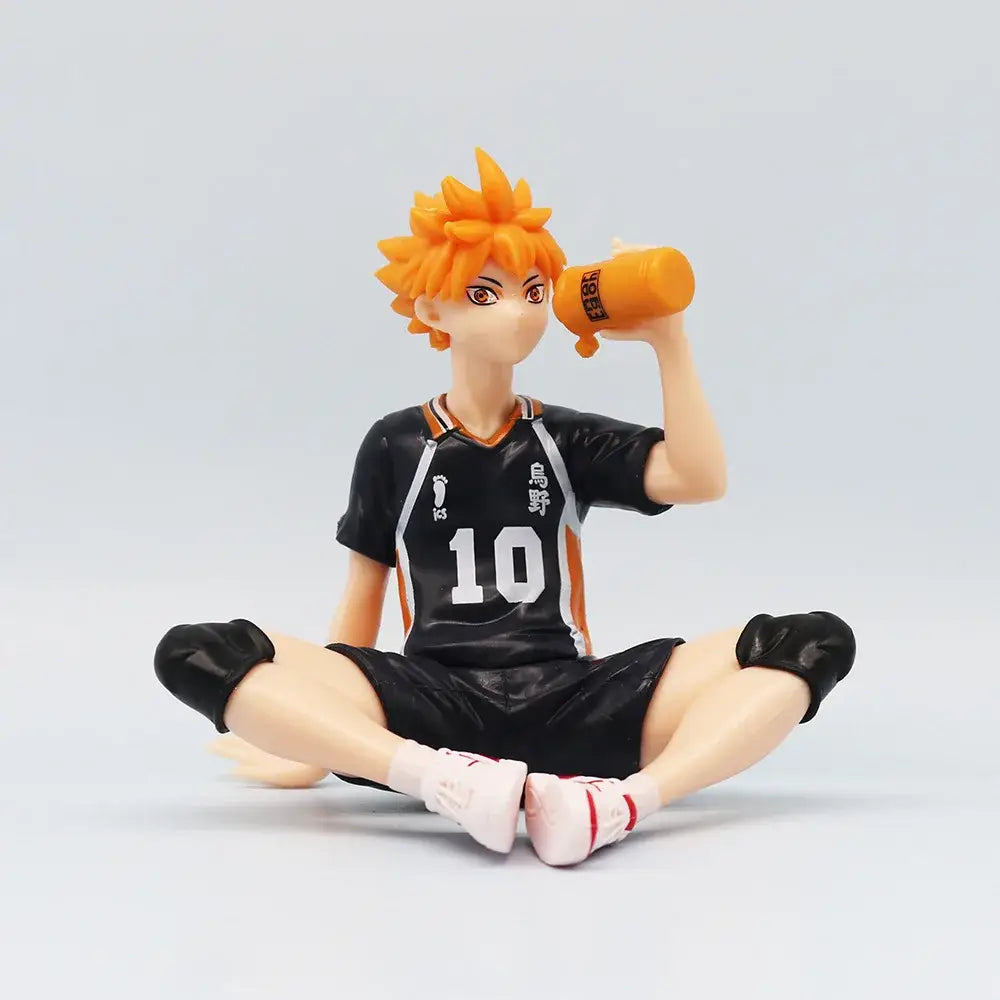 Haikyuu shoyo hinata noodle stopper pvc figure of orange-haired volleyball player in black and orange uniform holding bottle