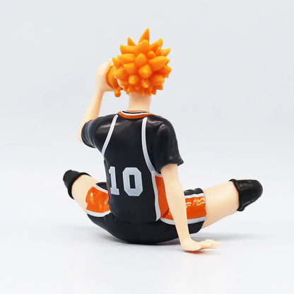 Back view of haikyuu shoyo hinata noodle stopper pvc figure in black orange uniform with number 10 on its back