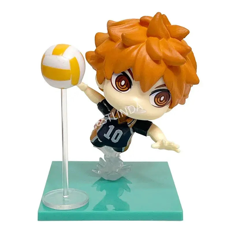 Haikyuu shoyo hinata pvc statue chibi-style orange-haired volleyball player in black jersey mid-spike with ball on stand