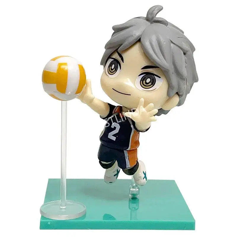 Chibi-style haikyuu shoyo hinata pvc vinyl figurine with gray hair and orange-and-white jersey posed mid-air serving