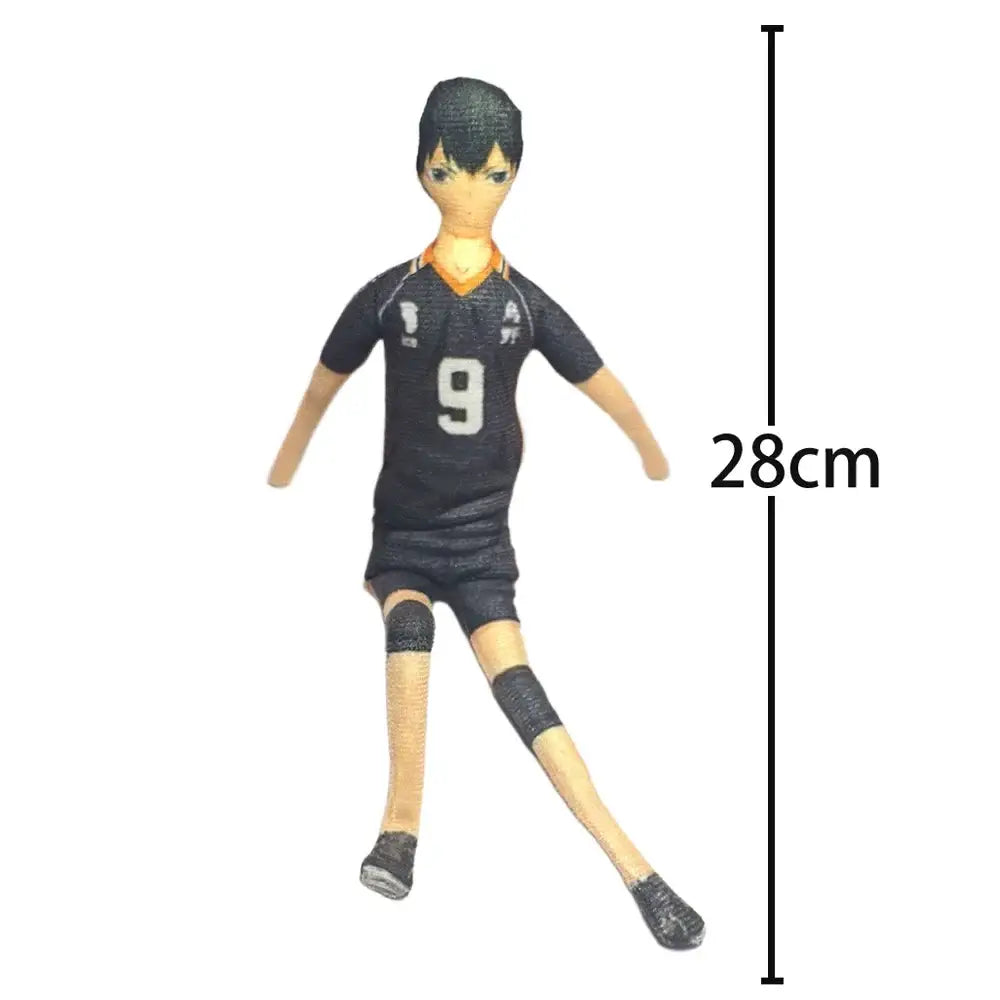Black vinyl figure of tobio kageyama in dynamic volleyball pose wearing jersey number 9 with orange trim and black shorts
