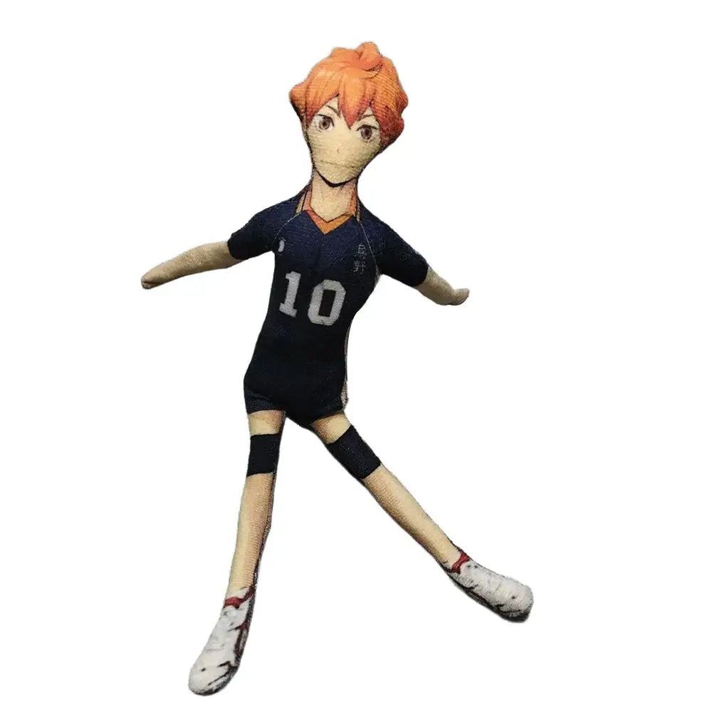 Orange-haired tobio kageyama plush doll wearing navy blue volleyball jersey number 10 and black shorts soft toy