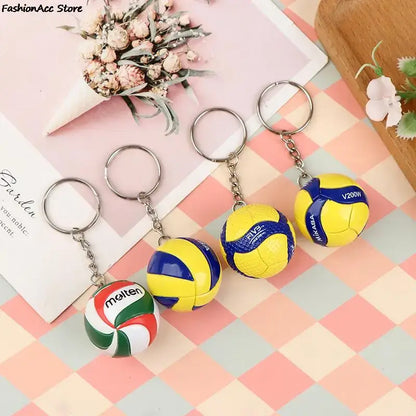 Haikyuu volleyball keychain set with miniature yellow and blue PVC volleyballs and metallic rings for fans