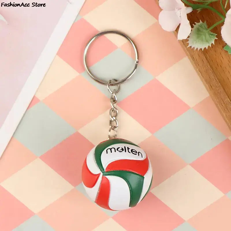 Haikyuu volleyball keychain featuring a red white and green pvc molten volleyball with silver metal ring and chain