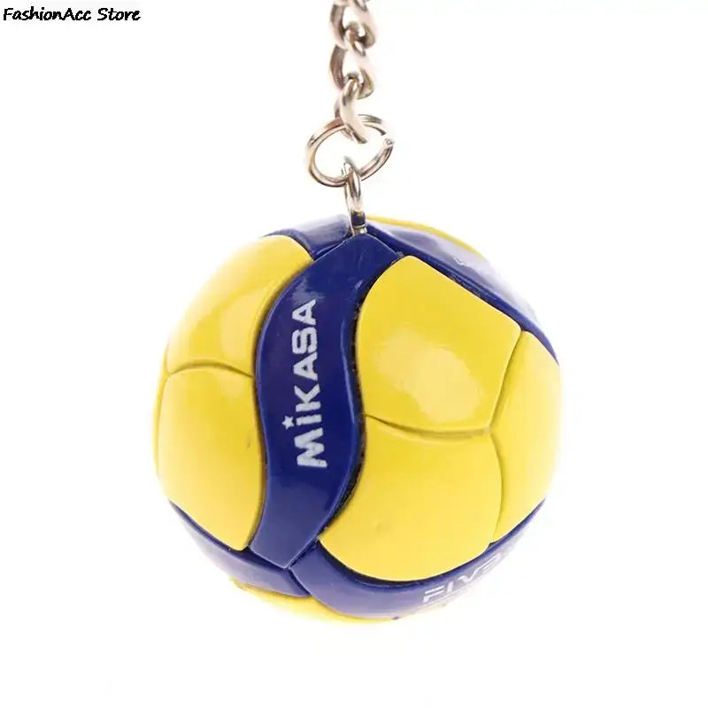 Yellow and blue mikasa volleyball keychain pvc ornament with a metallic chain from haikyuu volleyball keychain collection