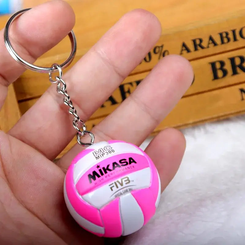 Pink and white mikasa volleyball pvc keychain with silver metal chain and ring haikyuu sport ball design
