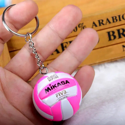 Pink and white mikasa volleyball pvc keychain with silver metal chain and ring haikyuu sport ball design