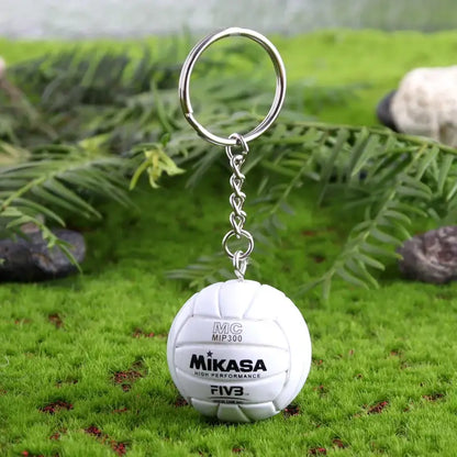 White mikasa volleyball pvc keychain with silver metal ring and chain from haikyuu volleyball pvc keychain collection