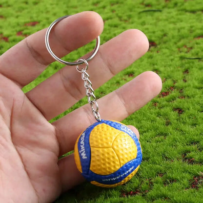 Yellow and blue mikasa volleyball pvc keychain with textured surface haikyuu sport ball design pvc keychain