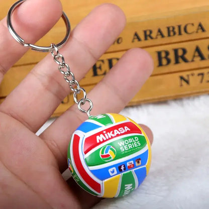 Colorful mikasa volleyball pvc keychain with metallic chain featuring vibrant yellow blue green and red panels