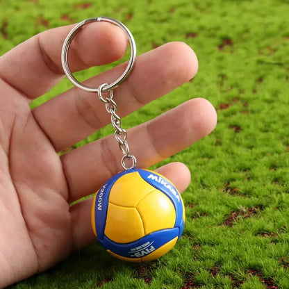 Haikyuu volleyball pvc keychain featuring a miniature yellow and blue mikasa volleyball with metallic ring and chain