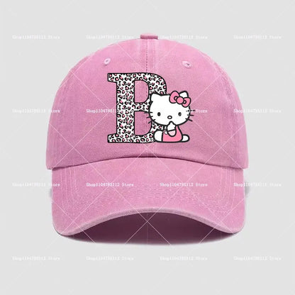 Pink cotton kitty distressed dad hat with leopard-print letter b and hello kitty peeking behind it