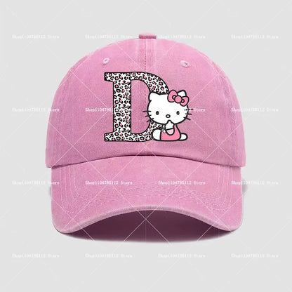 Pink cotton hello kitty distressed dad hat featuring a leopard-print a–z letter d with hello kitty peeking behind it
