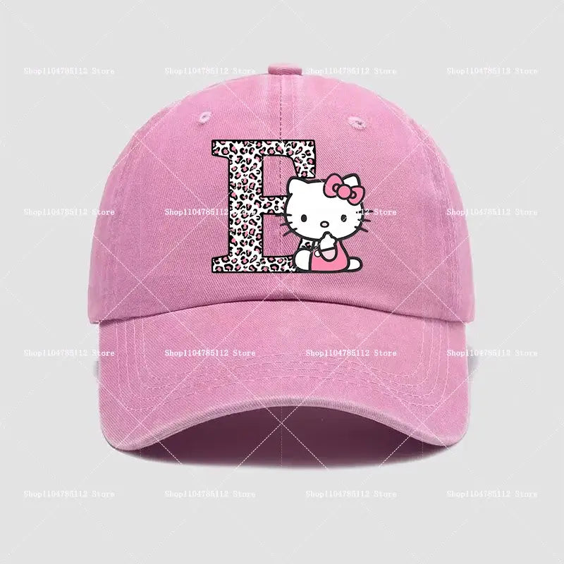 Pink cotton hello kitty distressed dad hat featuring leopard print a–z letter e with hello kitty peeking out