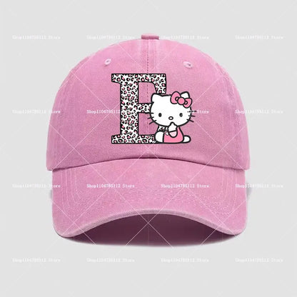 Pink cotton hello kitty distressed dad hat featuring leopard print a–z letter e with hello kitty peeking out