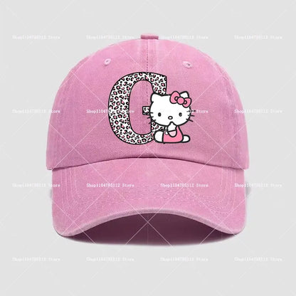Pink cotton hello kitty distressed dad hat featuring leopard-print a–z letter c with hello kitty peeking out
