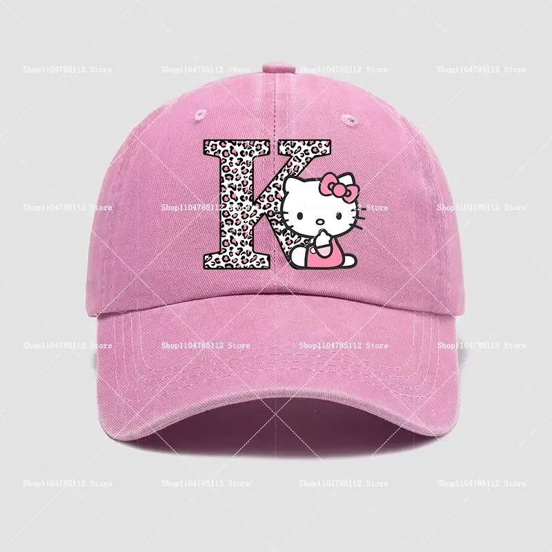 Pink cotton hello kitty distressed dad hat featuring an a-z letter k with leopard print and kawaii character embroidery