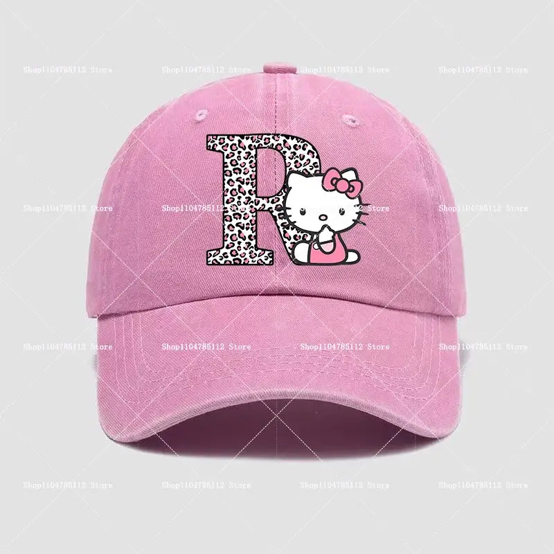 Pink cotton hello kitty distressed dad hat featuring a leopard-print a-z letter r with hello kitty peeking behind it