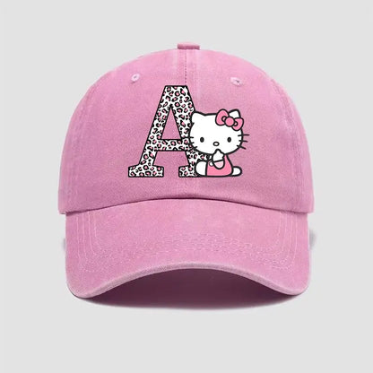 Pink cotton hello kitty distressed dad hat with leopard print a–z letter and kitty peeking behind the letter a