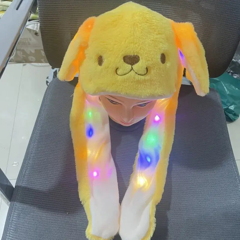 Yellow Hello Kitty plush winter hat with glowing LED light-up moving ears and long floppy ear flaps plush winter hat