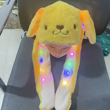 Yellow Hello Kitty plush winter hat with glowing LED light-up moving ears and long floppy ear flaps plush winter hat