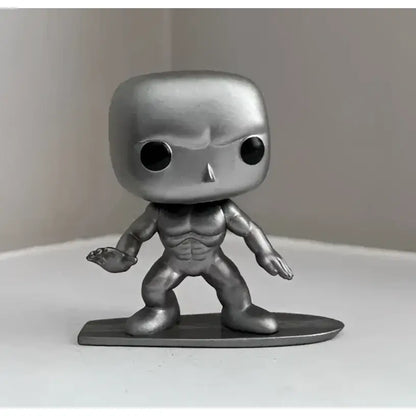 Silver metallic funko pop surfer figure with defined abs on surfboard from high quality sword art online toys