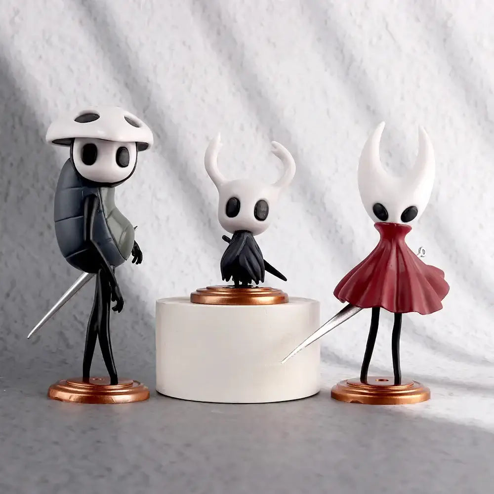 Three hollow knight pvc anime figures in black armor, black robes with horns, and red dress for figure collection
