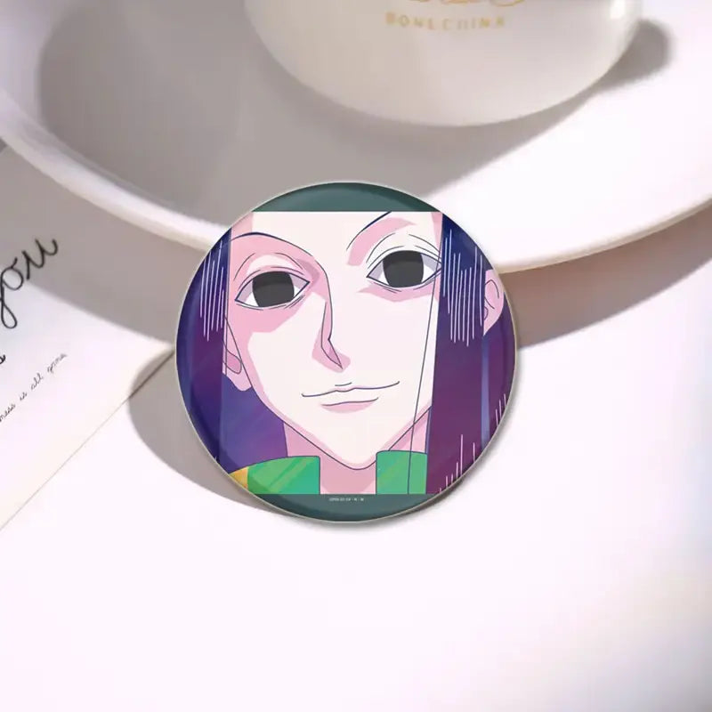 Circular hunter x hunter character pin featuring a stylized purple-haired portrait with green collar on metallic finish