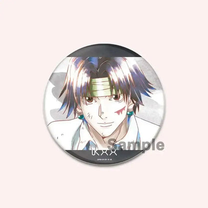 Circular handmade hunter x hunter character pin featuring an anime character with spiky dark hair and red face markings