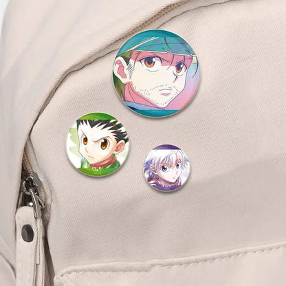 Three vibrant handmade hunter x hunter character pins with glossy finish featuring distinct anime designs