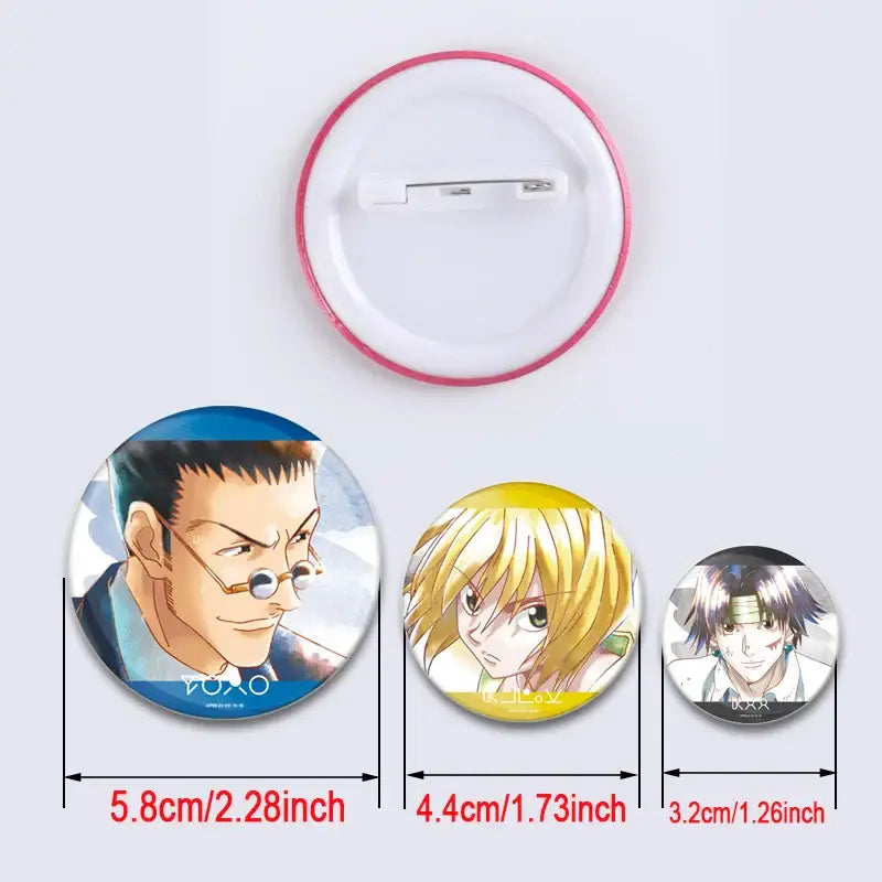 Three circular hunter x hunter character pins with pink yellow and silver metallic frames handmade badge