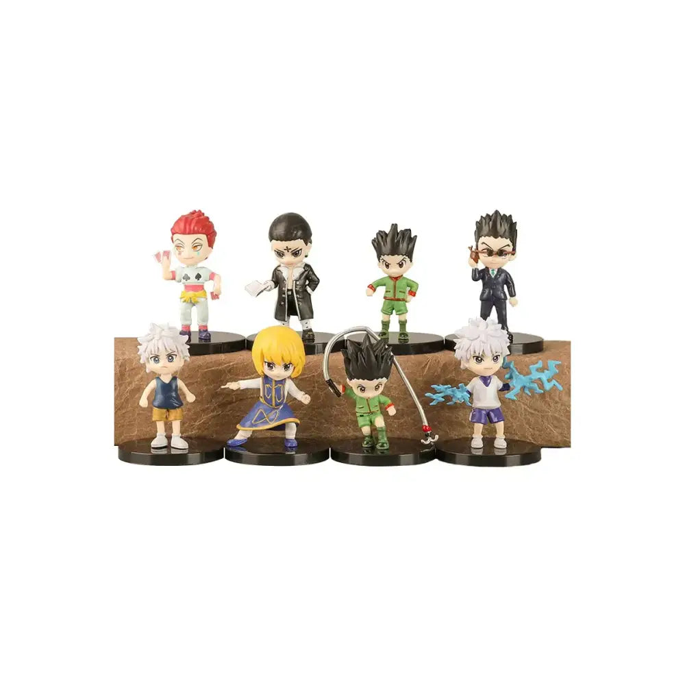 Set of eight chibi-style hunter x hunter gon freecss pvc figures with detailed colorful costumes on black bases