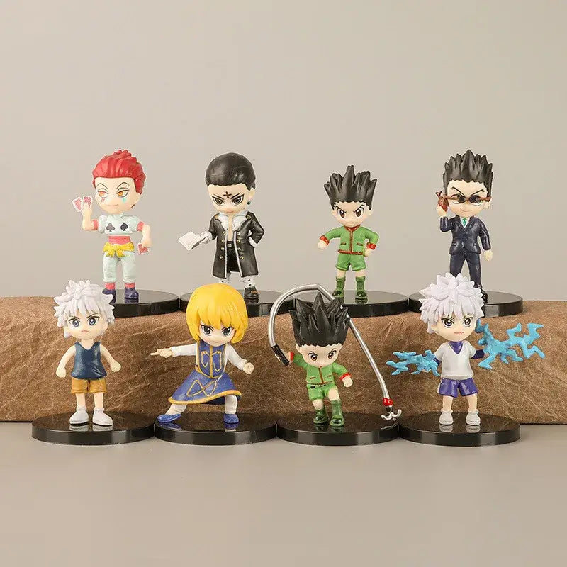 Set of eight hunter x hunter chibi pvc figures featuring gon freecss with detailed colorful outfits on black bases