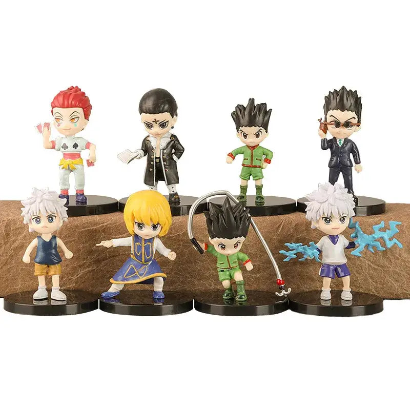 Set of eight chibi-style hunter x hunter gon freecss pvc figure figurines with vibrant colors on black bases