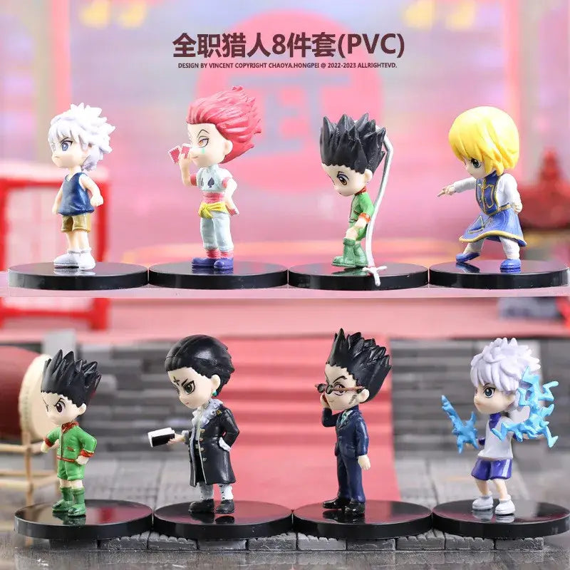 Set of eight hunter x hunter pvc figurines featuring gon freecss in signature outfits on black circular bases