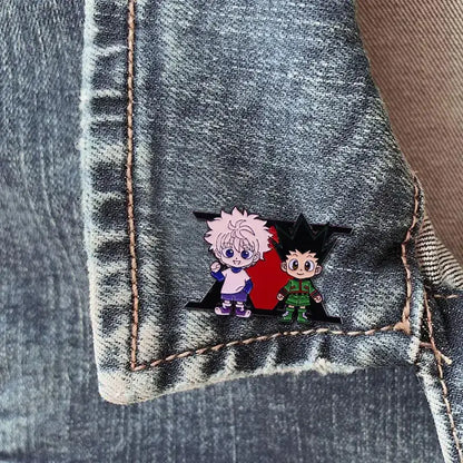 Hunter x hunter enamel pin featuring pink-haired and green-attired cartoon characters on a red background badge