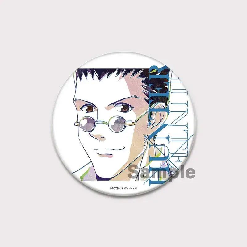 Circular white hunter x hunter pin badge featuring anime character killua with spiky black hair and round glasses