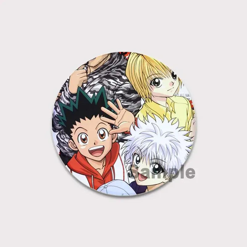 Circular colorful hunter x hunter pin badge featuring anime characters including killua with white hair and gon in orange hoodie