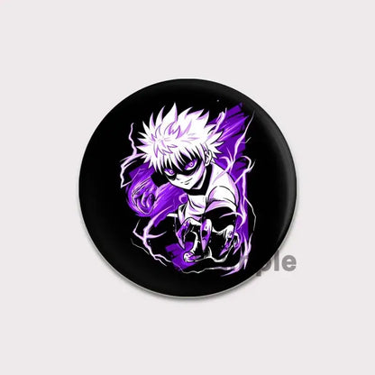 Black circular hunter x hunter pin badge featuring anime character killua with spiky white hair and purple energy effects