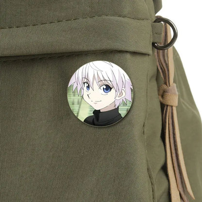 Hunter x hunter killua brooch snap-in pin badge features a circular smiling anime character with white hair on green background